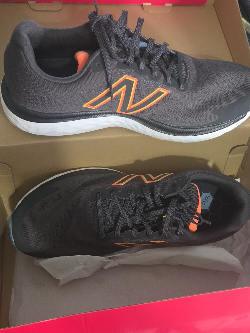 New Balance Black Athletic Shoes with Orange Trim